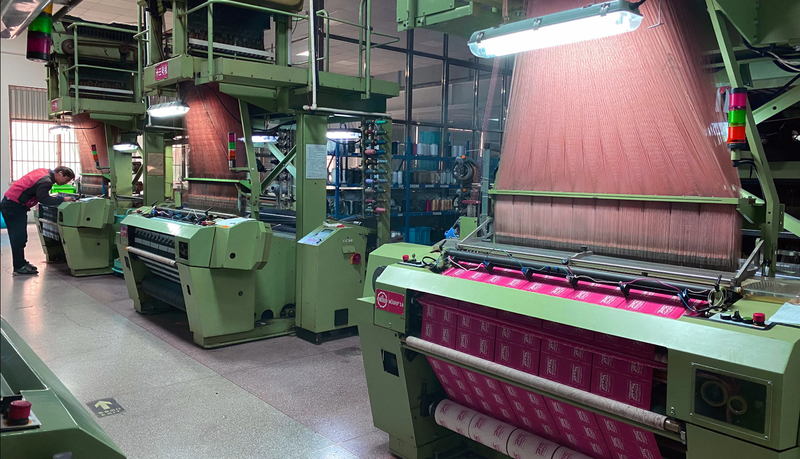 The Journey of Manufacturing Custom Woven Labels: From Design to Packaging